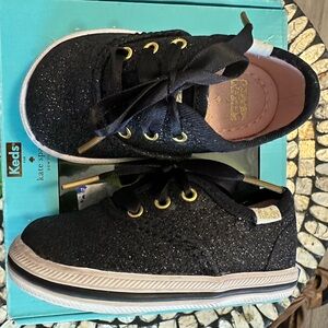 Kate Spade, black and gold sparkle keds. kids size 2 medium nwt in box.